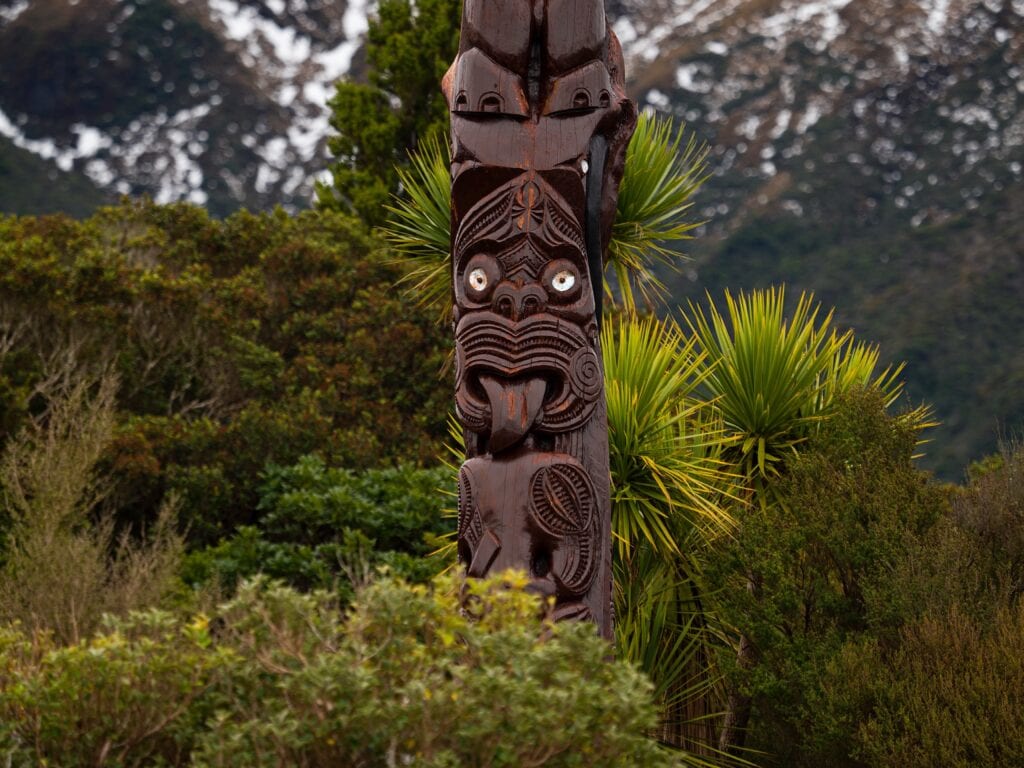 Detailed,Closeup,Of,Typical,Traditional,Pou,Whenua,Wooden,Pole,Whakairo